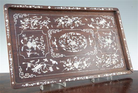 A Chinese rosewood and mother of pearl inlaid rectangular tray, late 19th century, 56 x 34cm